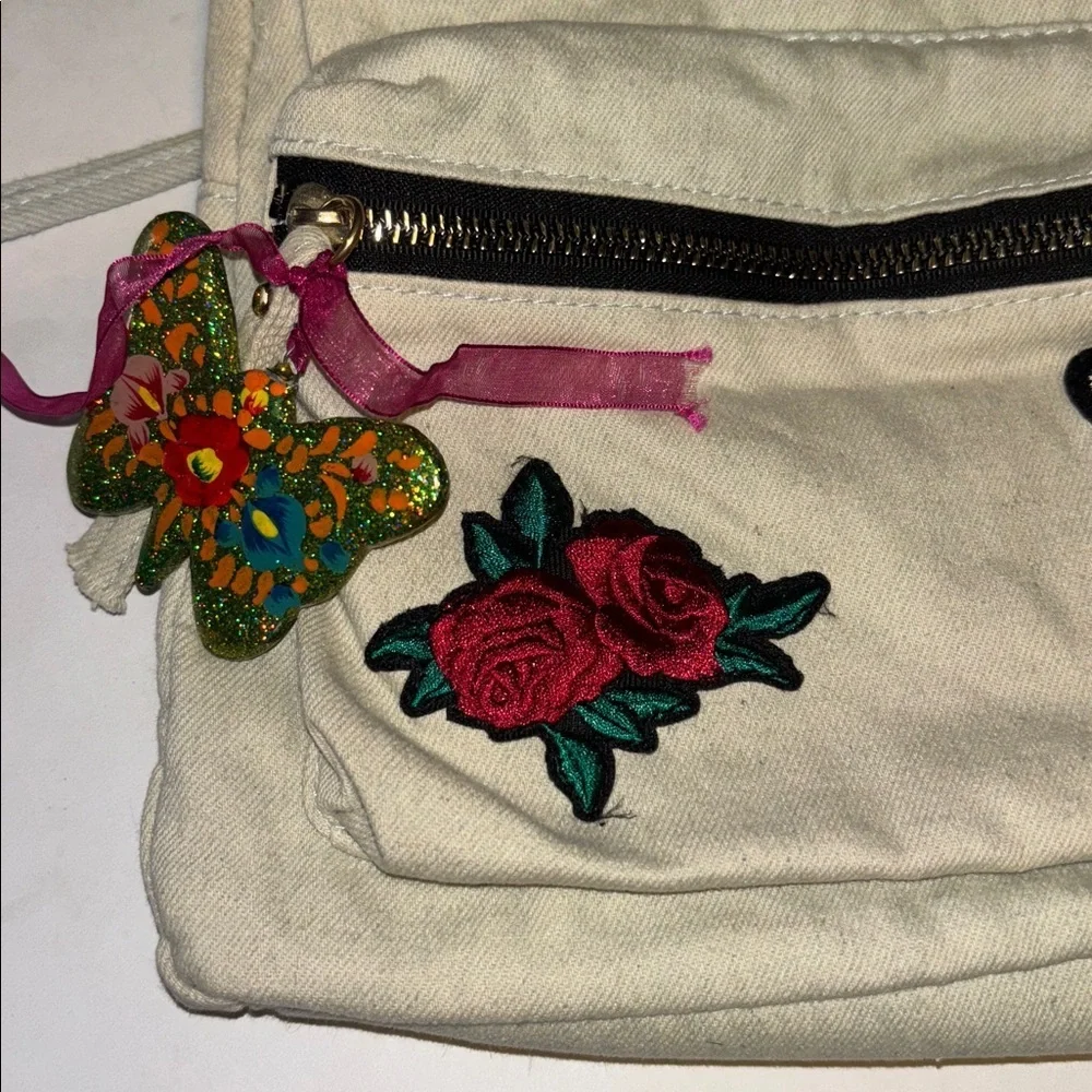 ATMOSPHERE BRAND OFF WHITE DENIM BACKPACK WITH BUTTERFLY PATCH DESIGN PRELOVED
